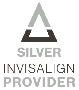 The image features a logo with the text  SILVER INVISALIGN PROVIDER  alongside an emblem resembling a stylized triangle, set against a light background.