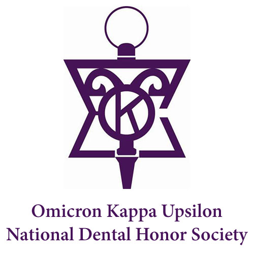 The image features a logo with a stylized letter  K  inside a shield-like emblem, accompanied by text that reads  OMEGON KAPPA UPSILON NATIONAL DENTAL HONOR SOCIETY  and below it is the name  OMICRON KAPPA UPSILON .
